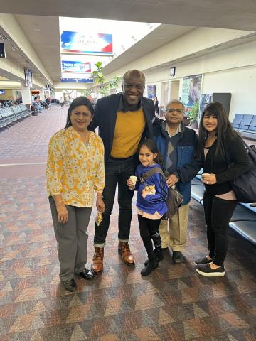 Mayor Yemi greeting travelers at the Colorado Springs Airport