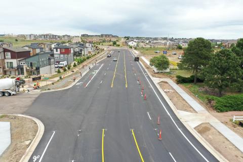 A picture of the reopened Tutt Blvd. on 8/26/24 with new sidewalks, lanes, and bike lanes.