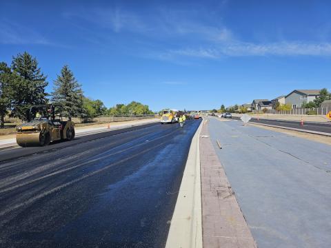 Southbound Black Forest road gets paved with a new median in place.