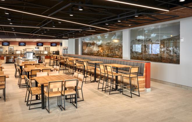 tables and chairs inside the dining area in the Pikes Peak Summit Visitor Center