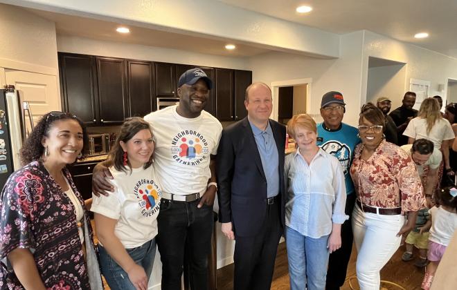 Mayor Yemi stands with Governor Jared Polis, Abbey Mobolade and other community leaders during the 1,000 neighborhood gatherings kickoff