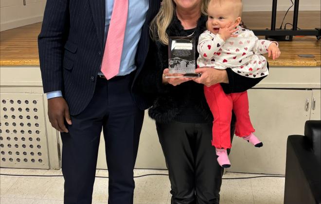 Mayor Yemi and Cindy Aubrey take a picture together after the presentation of her Spirit of the Springs award