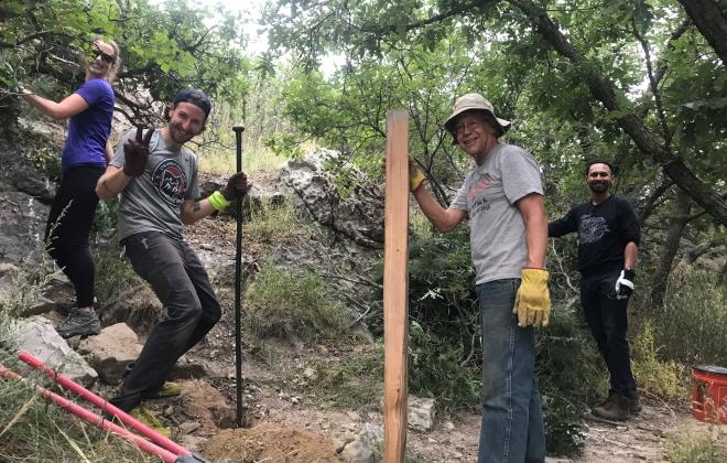 volunteers working on a trail