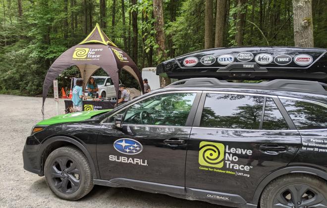 vehicle covered in leave no trace and hot spot decals